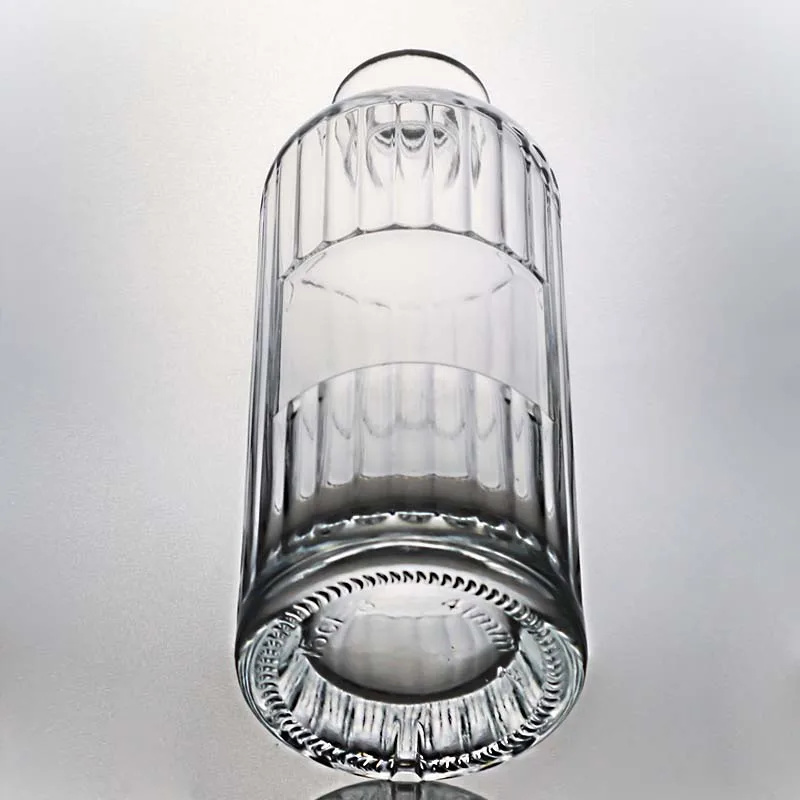 Customizable capacity embossed round shape spirit glass bottle with cork for whisky vodka tequila gin rum