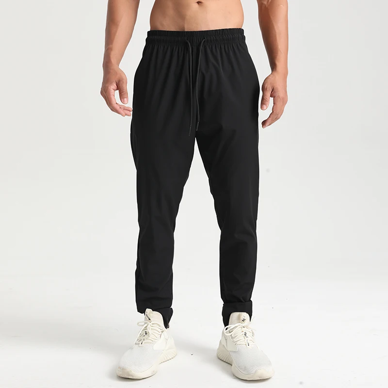 Factory direct sales four solid color blank trousers with drawstring texture quick dry fabric zipper pocket sweatpants men
