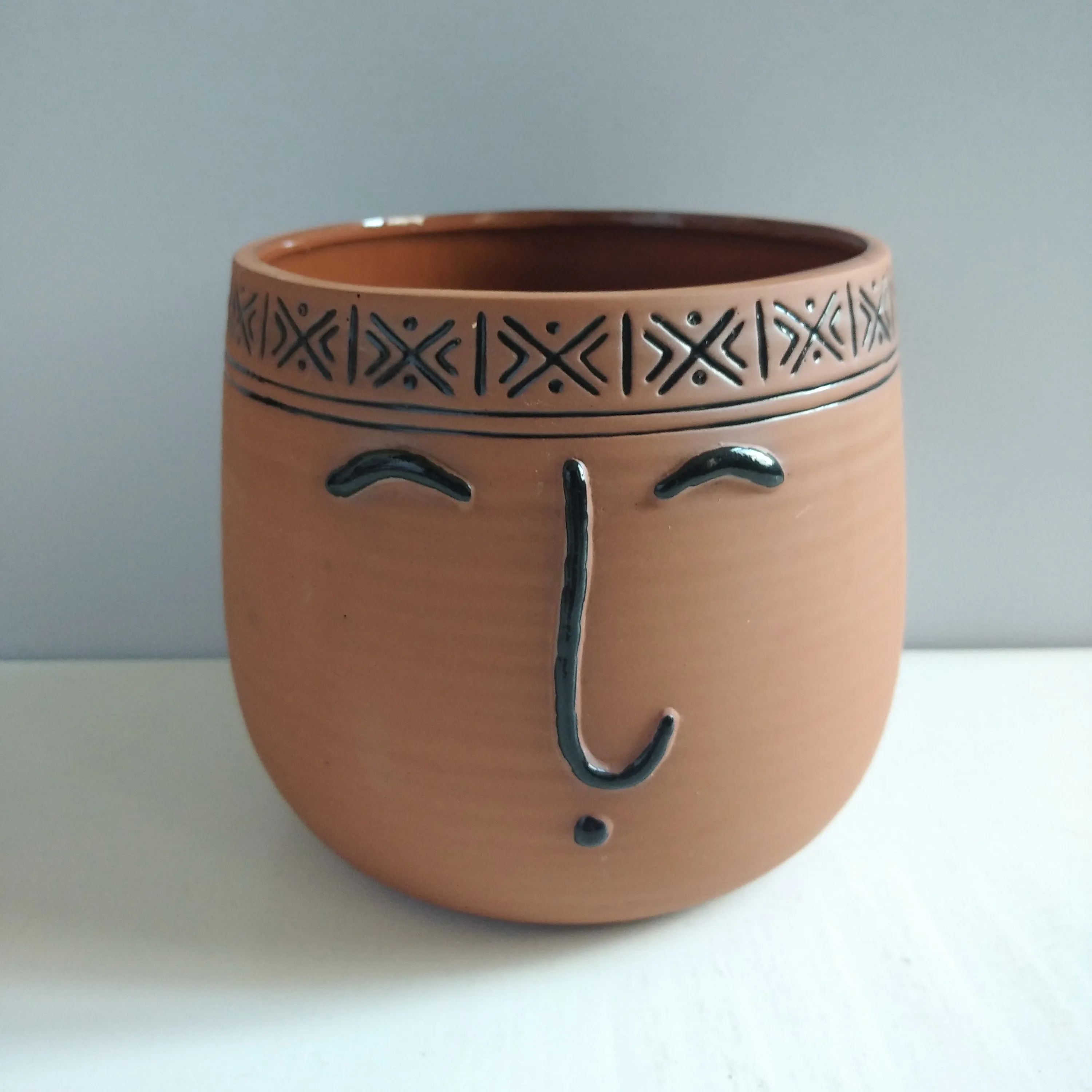 Cheap hand painted human face brown large unglazed terracotta flower pot for wholesale