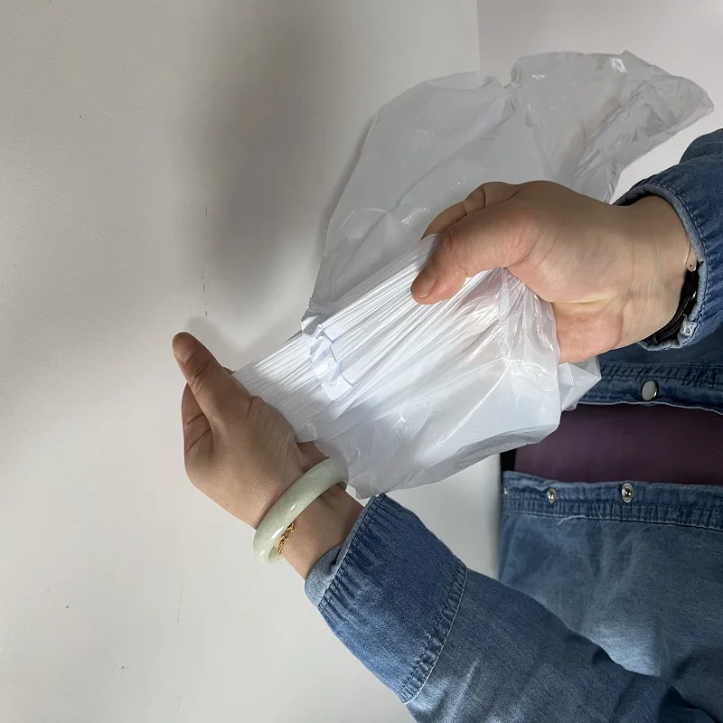 Heavy Duty White Garbage Bag Rolls with Easy-Tear Perforations HDPE Material Bulk Supply for Residential Use