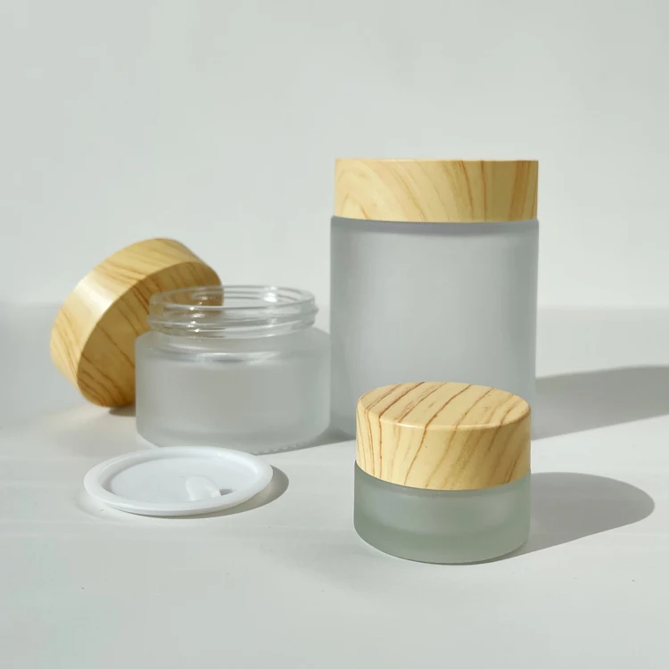 Wholesale 5g 10g 15g 30g 50g 100g cream skincare packaging white frosted glass jar with bamboo Plastic wood grain