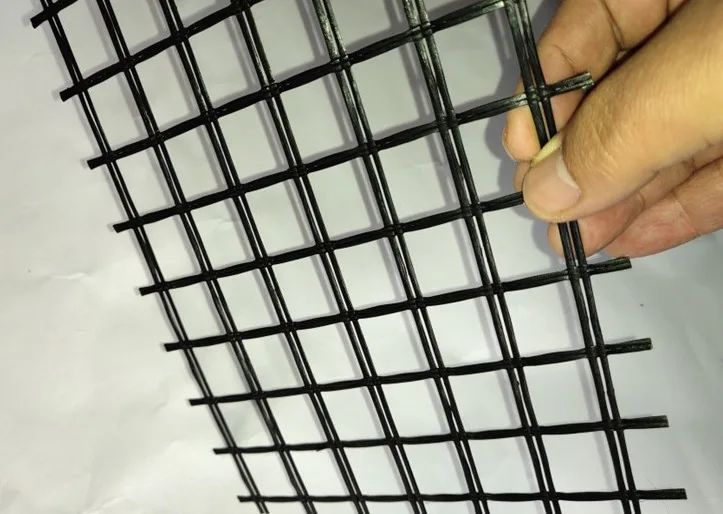 High Tensile Strength Bitumen Coated Composite Nonwoven  Fiberglass Geogrid  for Asphalt Overlayer Reinforcement Gravel