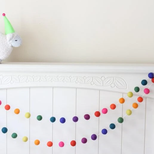 
handmade wool felt ball garland by sheep 