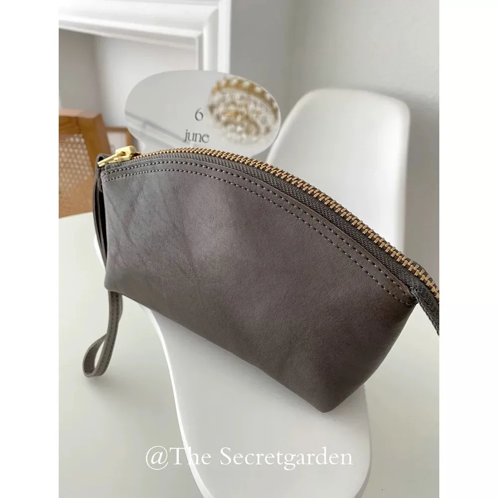 Premium Cowhide Leather Makeup Bag Zipper Closure Big-Name Kneading Mobile Phone Wristband Hand Bag Cosmetics Beauty Products