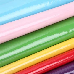 Patent glossy shoes and bag material fabric for bag and cosmetic