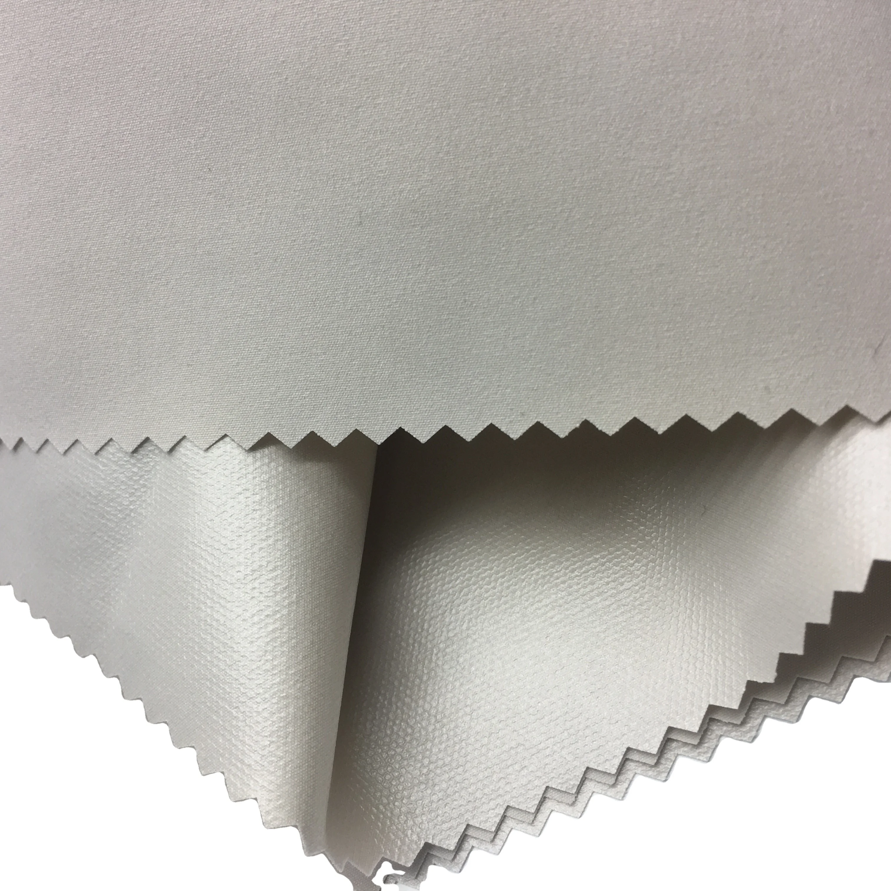 
Wujiang polyester 75D T400 mechanical stretch yarn fabric cotton touch bonded with clear TPU membrane 