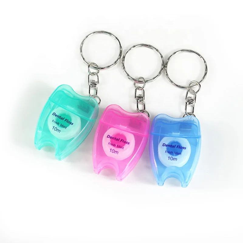 ISO Approved Bulk OEM Mint Flavor Oral Hygiene 10m Tooth Shape Keychain box Flosser Dental Floss