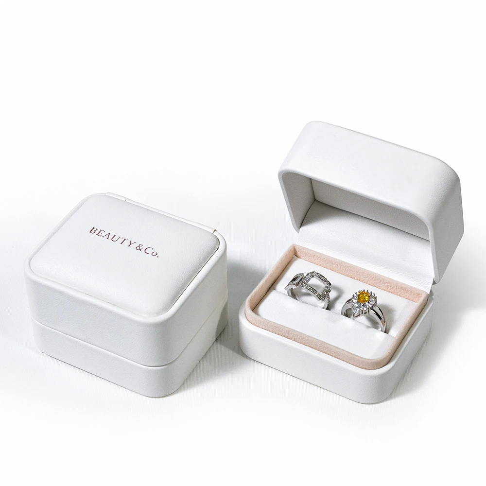 Оптовая продажа на заказ высокое качество зеленый черный белый искусственная кожа золотой бриллиант двойное обручальное кольцо коробка