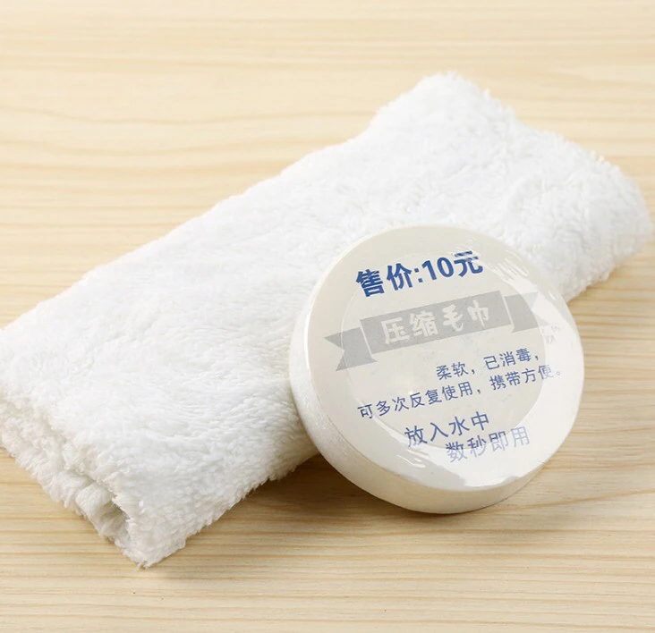 Wholesale Chinese factory compressed disposable hotel travel small towel