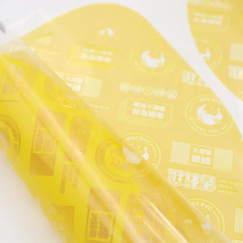 Custom Print Plastic Film Laminated Heat Seal Flexible Food Packaging Material Clear Roll Film Food Grade Packaging