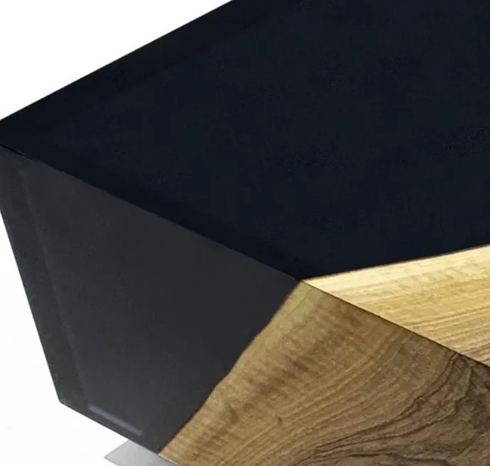 The solid wood coffee table with contemporary cube black wood grain is creatively placed in the living room and office