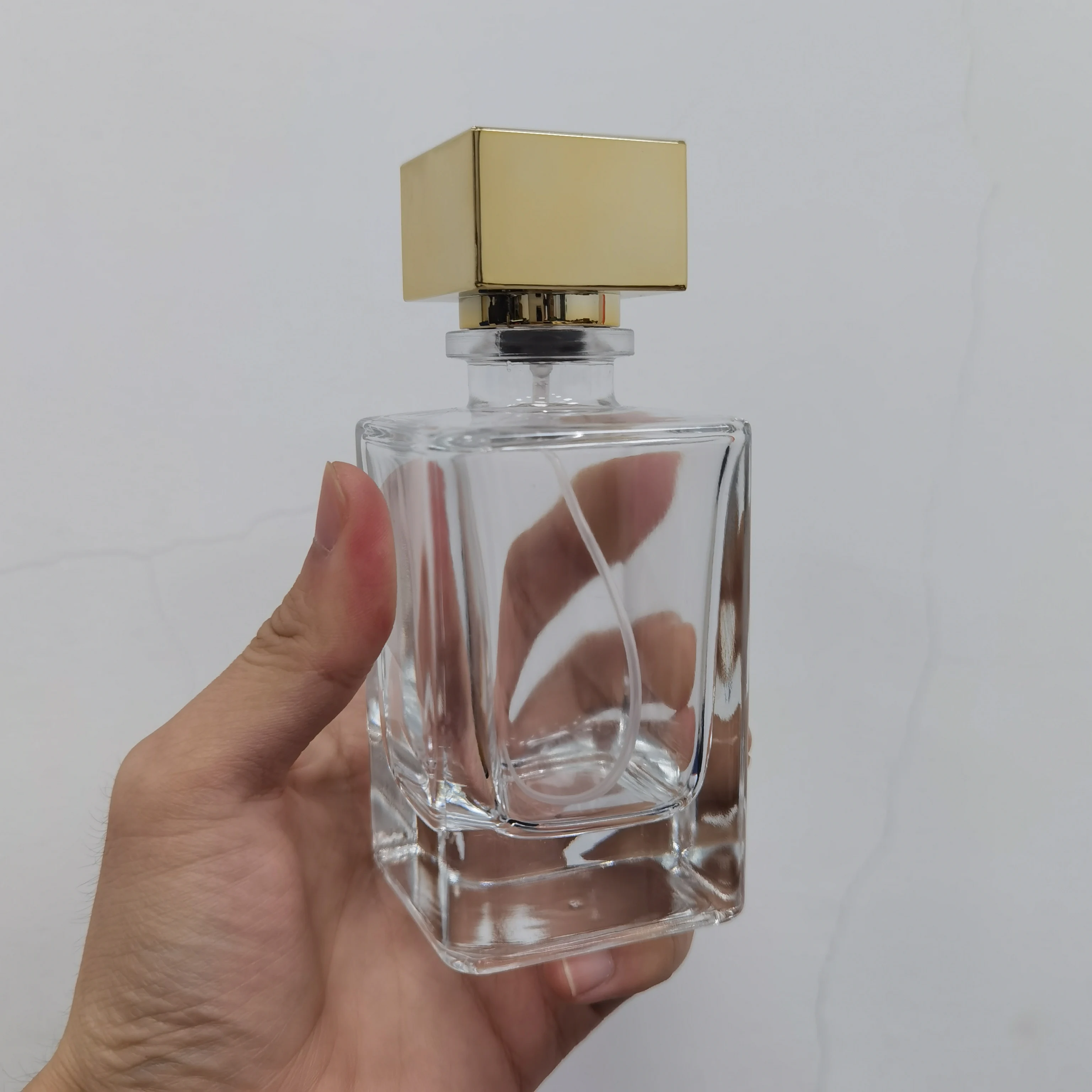 Wholesale New Heavy Rectangle Perfume Bottle 30ml 50ml Glass Fragrance Bottle 100ml Crimp Perfume Bottle with Square Cap