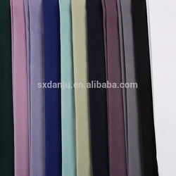 cheap price dubai fabric 100 polyester 4 way spandex textured moss crepe plain fabric online