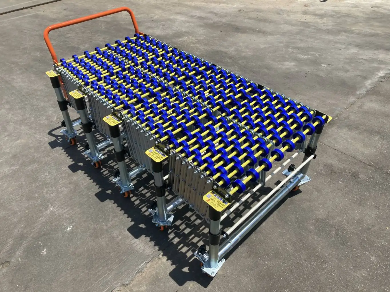 Truck loading unloading gravity plastic skate wheel nylon roller conveyor