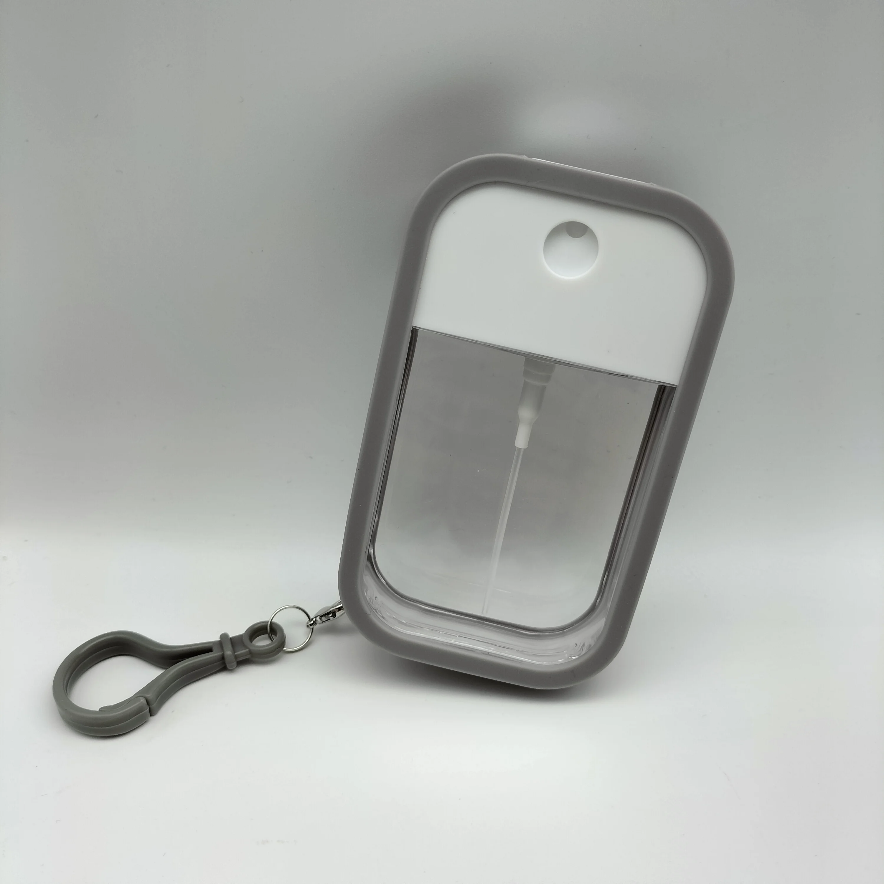 2021 New arrivals 50ml Pocket Sprayer Silicone Holder case Credit card Travel dispenser Holder case with key chain