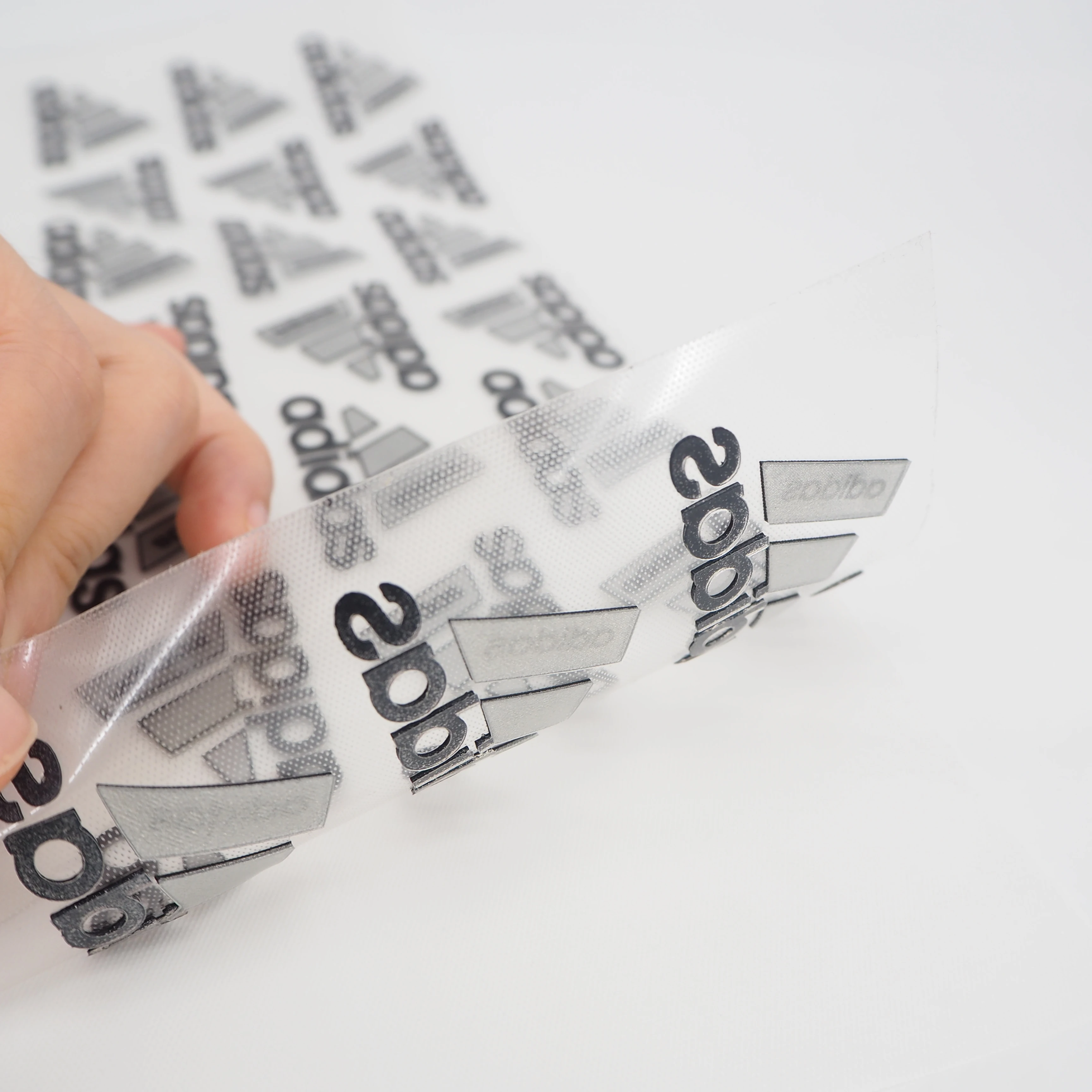 Custom Thermal Printed Embossed Heat Transfer 3D Thick Logo Rubber Silicone Label For Clothing Garment