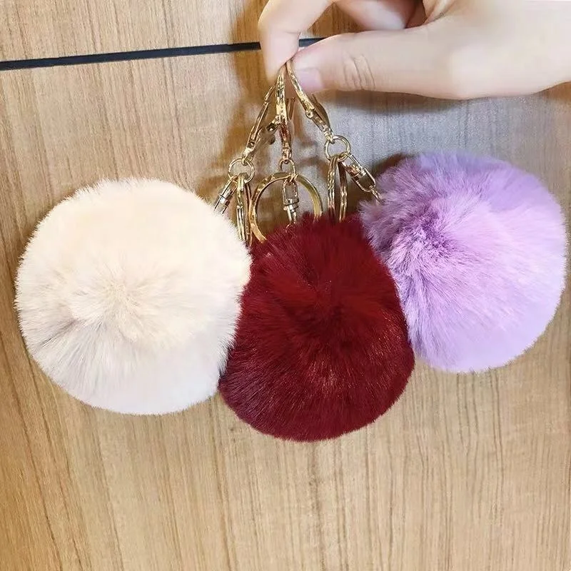 
doll key chain faux fur pom pom key chain wholesale key chain with 8cm diameter faux fur Factory price Shenzhen Lily Cheng 