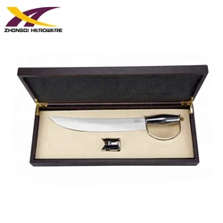 Varnished brown wooden case with stainless steel champagne swords and champagne stopper