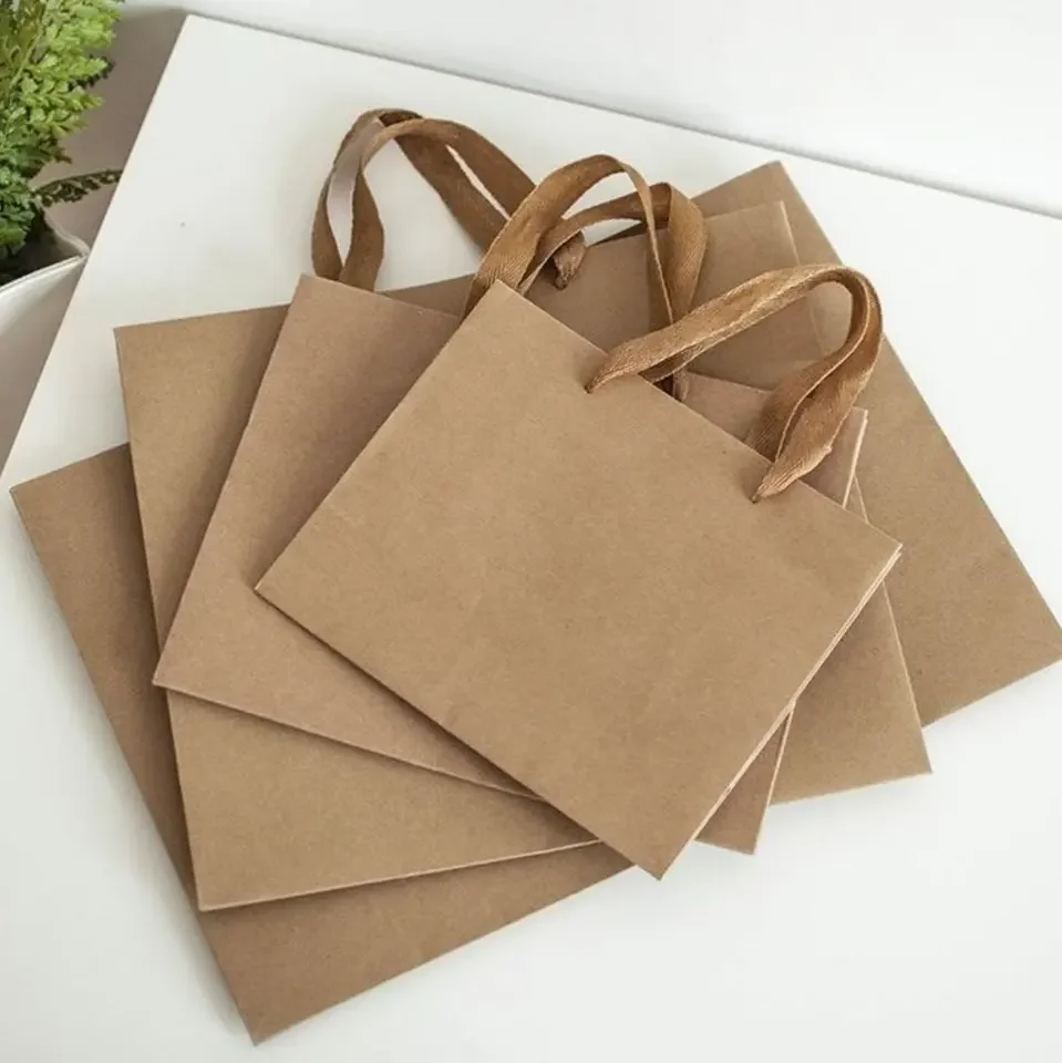 Wholesale Customized Paper Bag for Shopping Luxury White Paper Promotion Luxury Shopping Paper Bag With Custom Logo