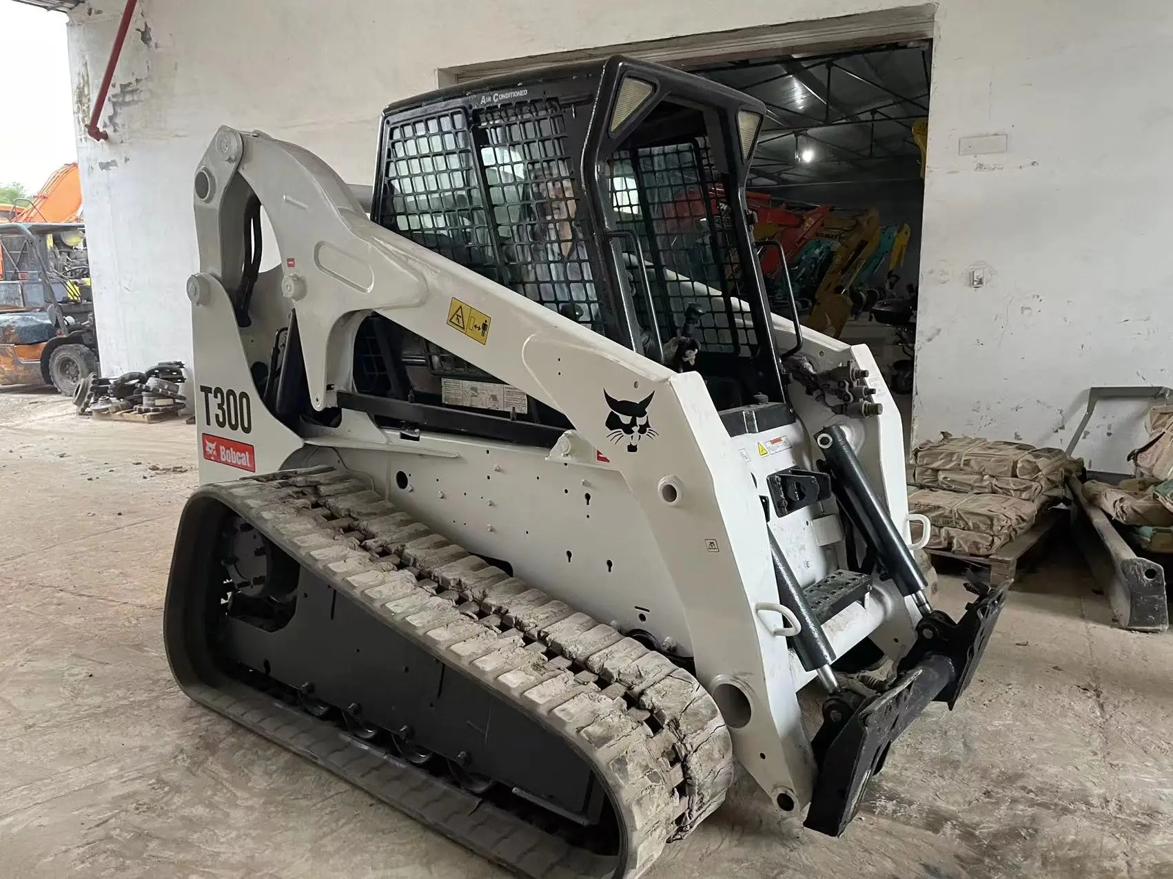 used T300 skid steer loader with  Tracks