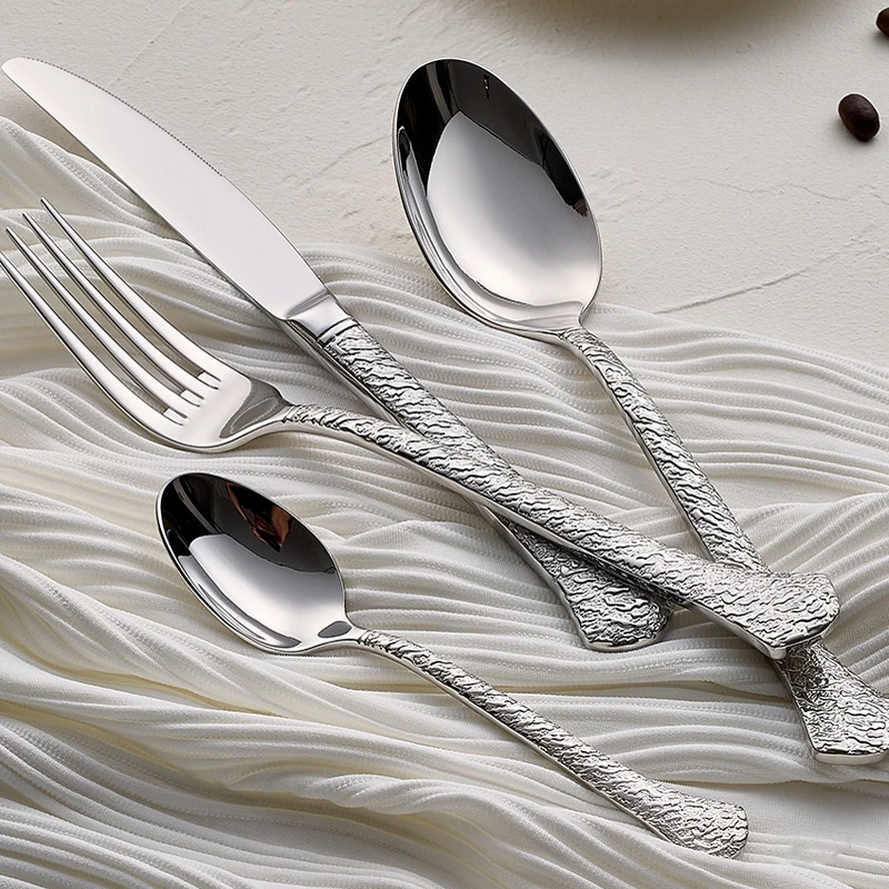 Wholesale 304 stainless steel French knife, fork and spoon retro rock plate relief cutlery set