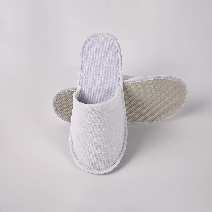 2023 hot selling custom logo anti slip sole terry towel upper hotel slippers white hotel disposable slippers