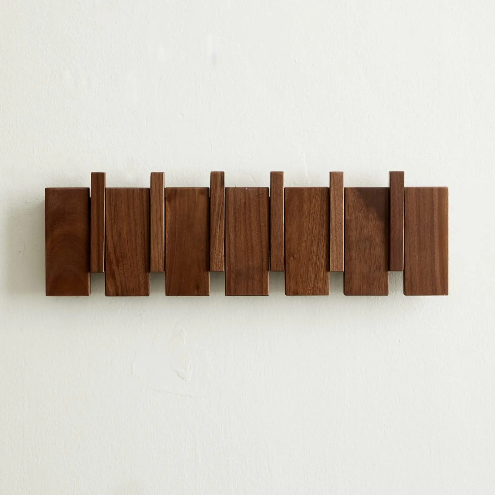 Wholesale premium modern wall trim coats and hats row hook hangers piano buttons designed solid wood storage racks