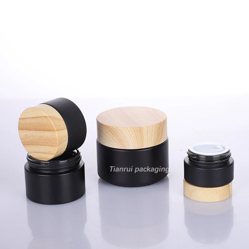 Wholesale 5g 10g 15g 20g 30g 50 Gram 1oz Face Cream Glass Jars Portable Matte Black Cosmetic Glass Jar with Bamboo Lid
