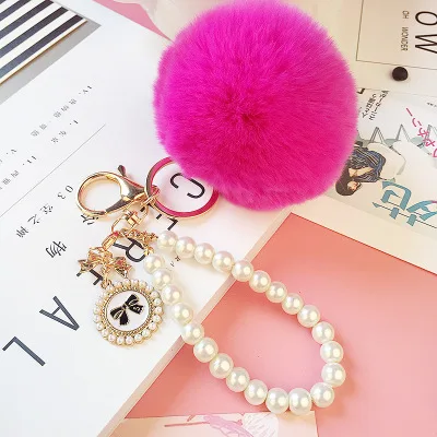 2022 Hot Sale Cheap Promotional Pearl Chain Charm Fluffy Cute 8cm Faux Fur  Key houlde Pompon Fur Ball Pom Keychain