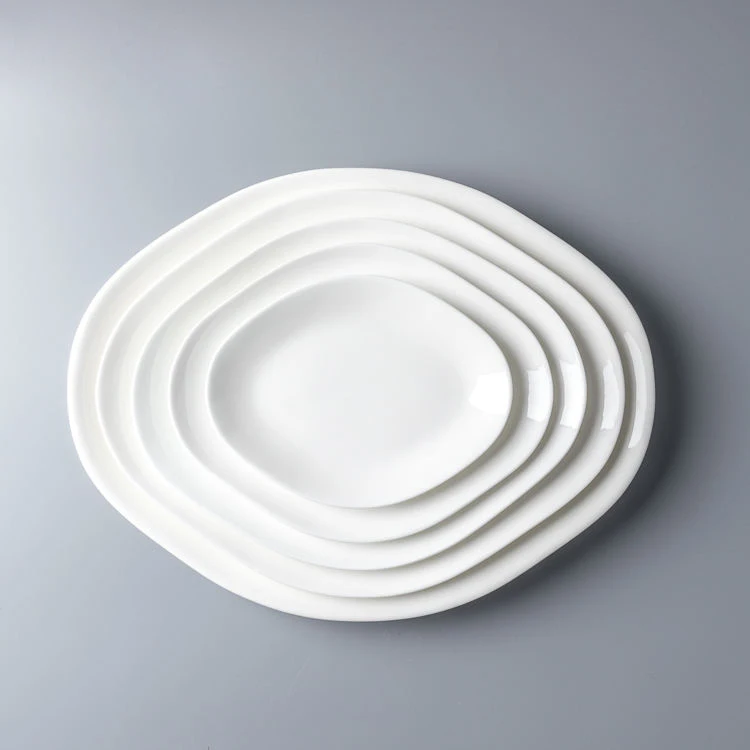 OEM 8/10/12/14Inch Food Grade Material White Oval Ceramic Plate Dinnerware For Star Restaurant Hotel