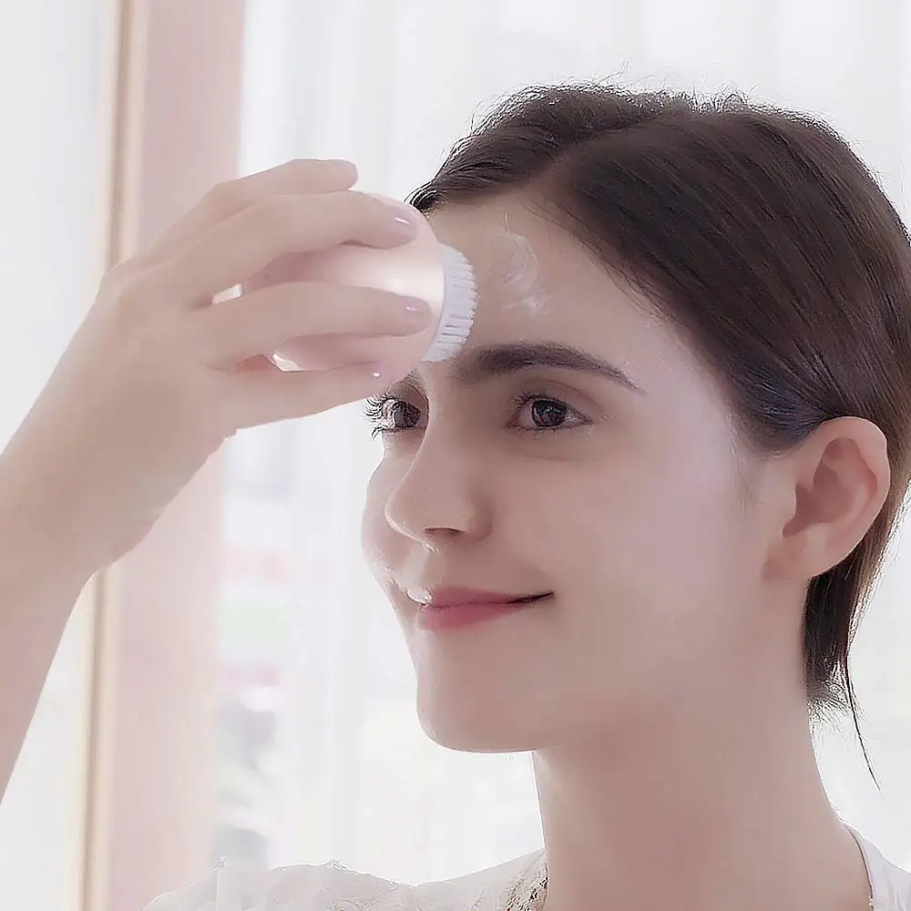 2022 New beauty product mini electric sonic silicone waterproof  vibrating facial cleansing brush