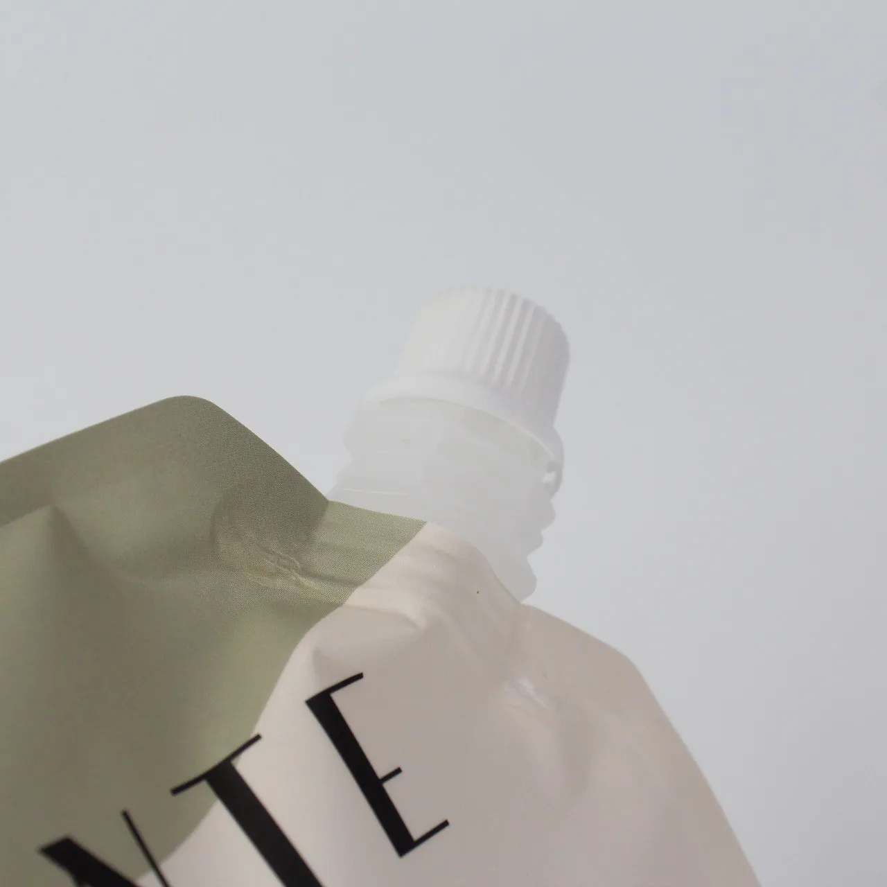 Food grace matte white plastic liquid clear drink juice stand up pouch bag with corner spout