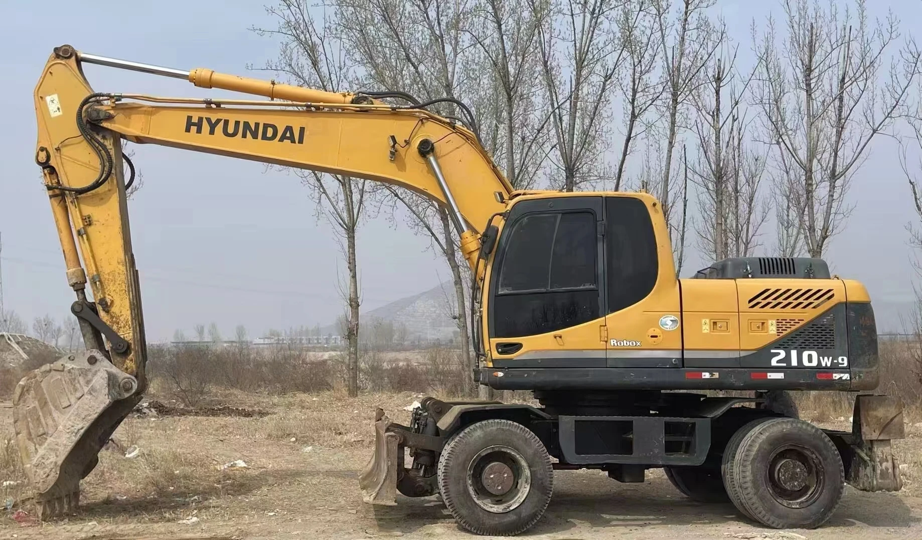 Колесный экскаватор Hyundai 210W-9 хорошего качества 21-тонный использованный 210 hyundai для дешевой продажи