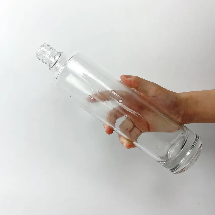 Long clear cylindrical glass alcohol bottle with thick bottom 500 ml