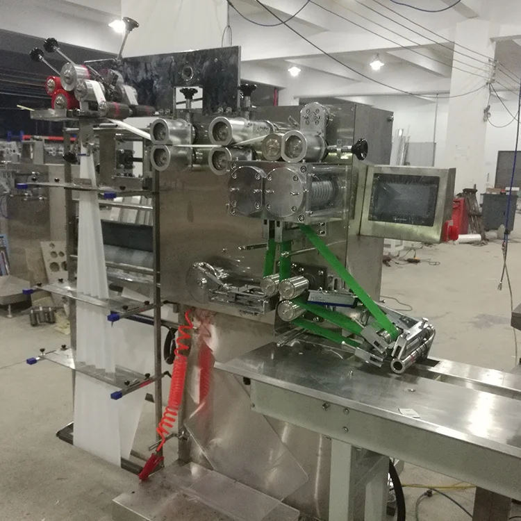 Automatic wet tissue napkin fork spoon cutlery packing machine manufacturer