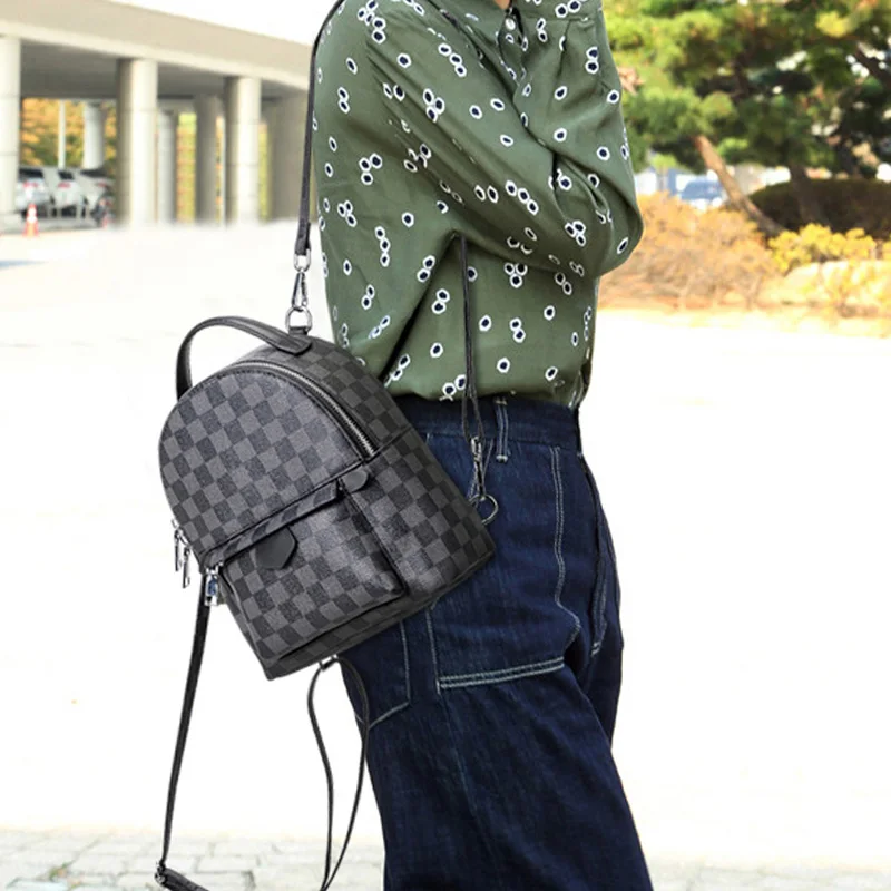 
2021 China large capacity wholesale new type checkered backpack single shoulder double shoulder function PU waterproof student b 