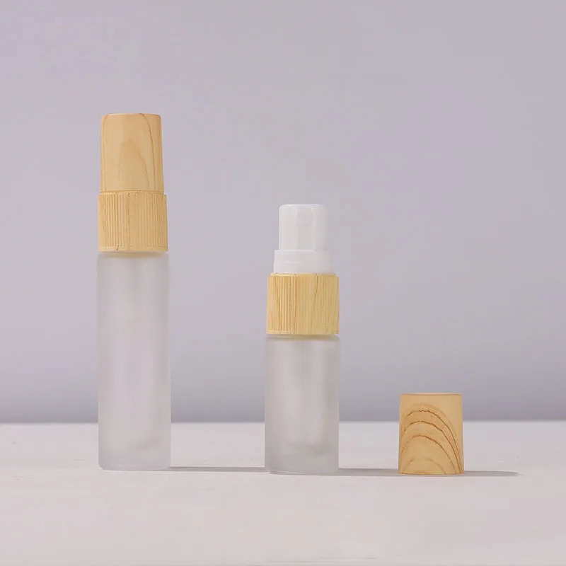 Stock 5ml 10ml frosted glass perfume bottle with bamboo lid glass spray bottle with wood grain spray for perfume