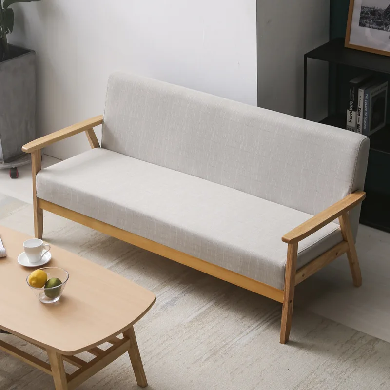 Small family simple modern pine sofa new pastoral cloth double single living room solid wood Japanese simple sofa chair set