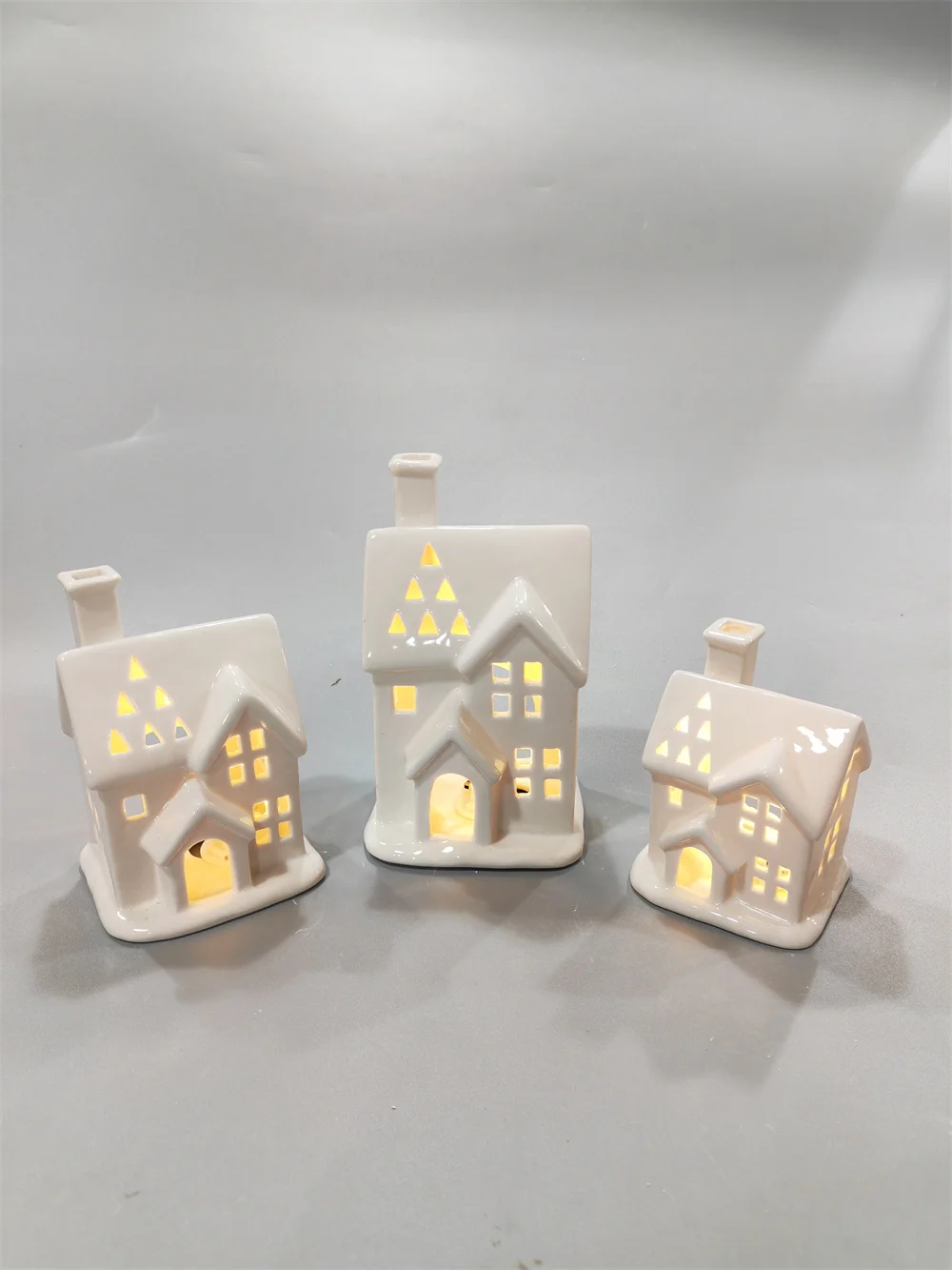 New product ideas 2023 white ceramic lighthouse ceramic white tea light house  chimney cottage church candle holder for decor