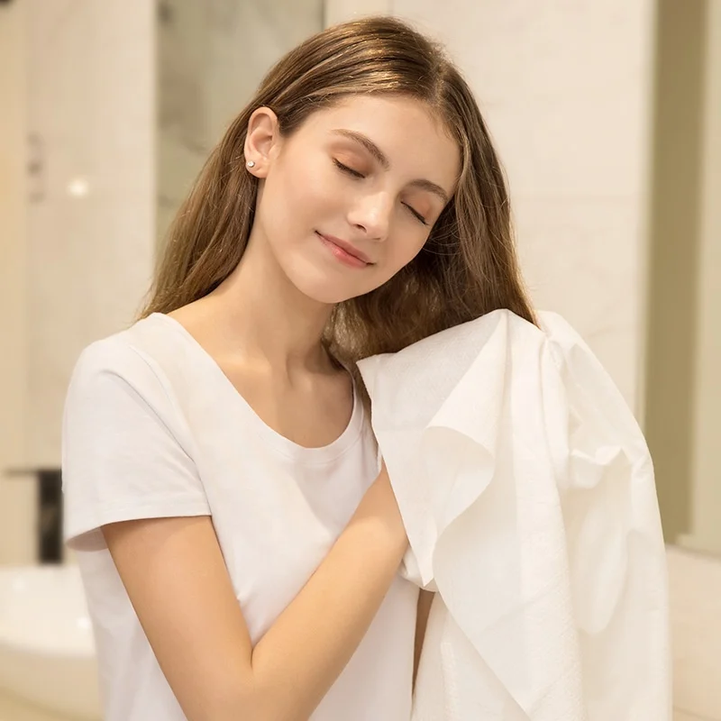 Оптовая продажа 70x140 см биоразлагаемый 100% хлопок белый одноразовый банный лист полотенце