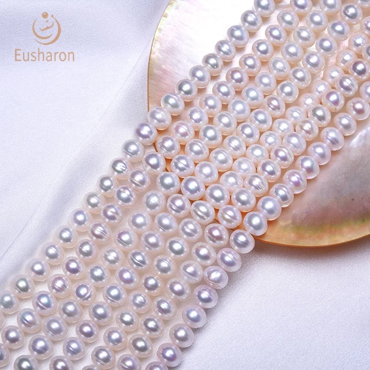 
Wholesale China White Flat Round Cultured Best Selling Fresh Water Pearls 