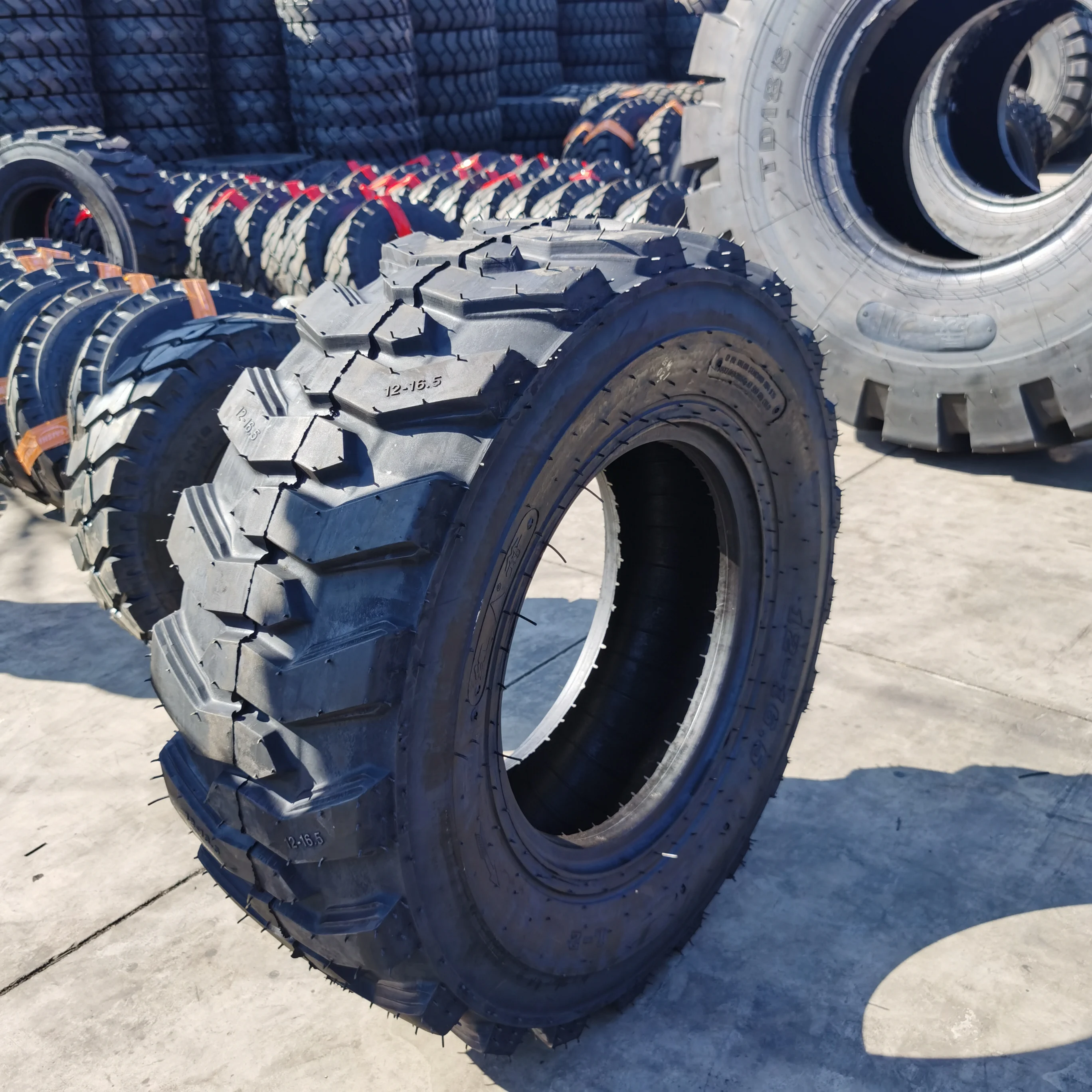 Industrial Tire 12-16.5 Skid Steer Tire Material Origin Type Quality Tyre Low Price
