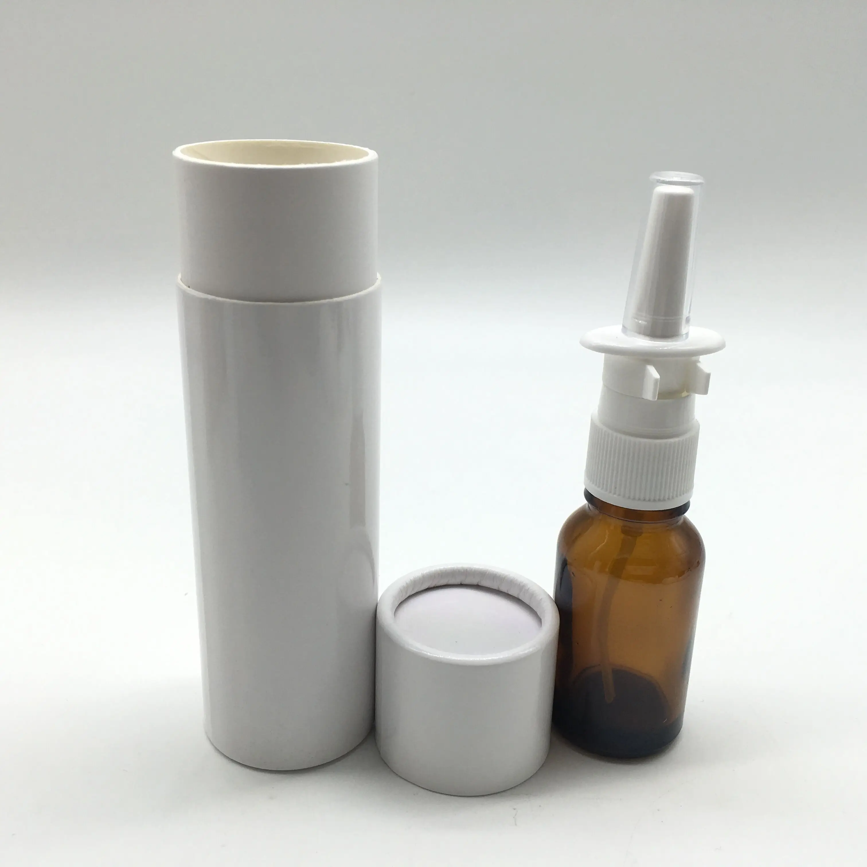 wholesale white Cosmetic Round Recycled Cardboard Paper Perfume Gift Box tube for cosmetic amber bottle with nasal sprayer
