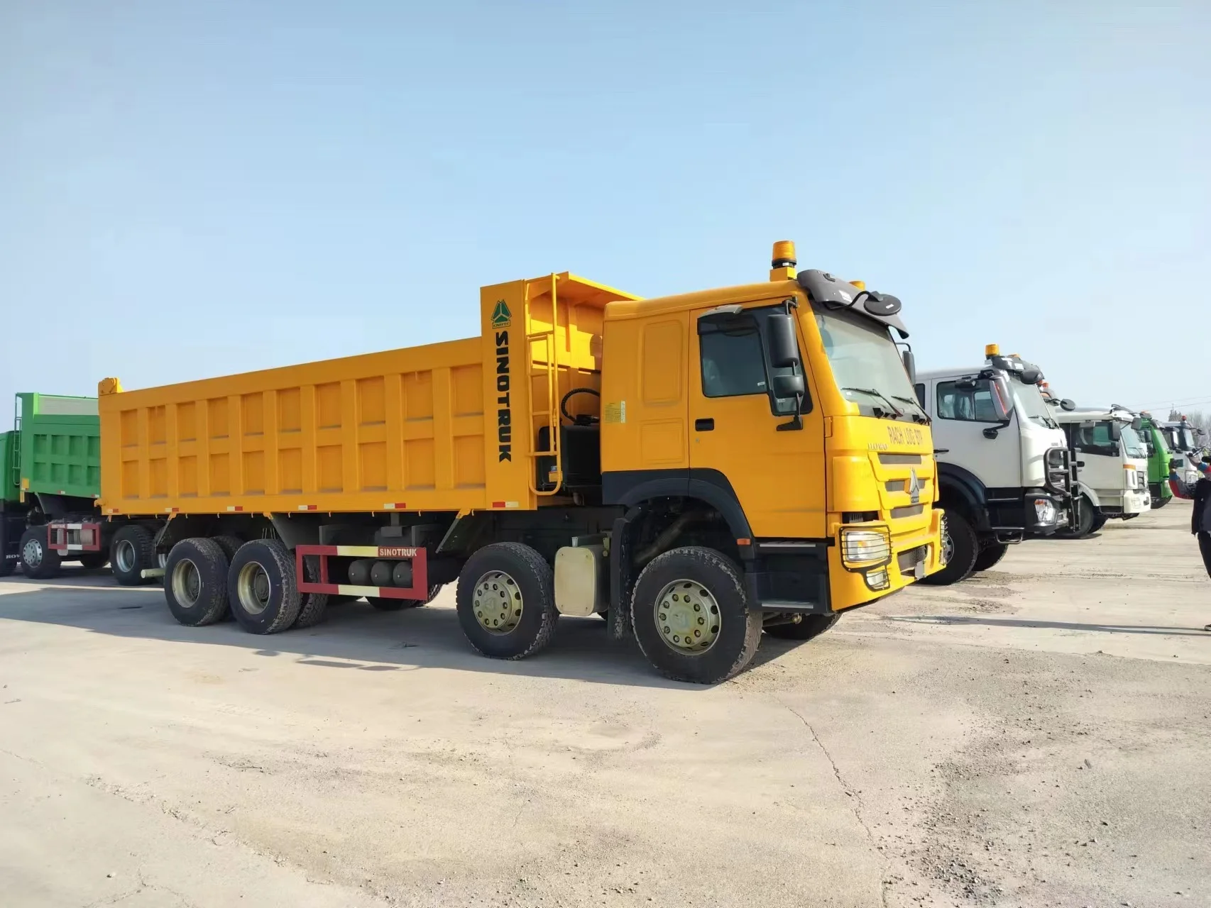 Transauto Sinotruk HOWO 8*4 Used Diesel Heavy Dump Truck Sale 10 Wheeler 30-40 Tons Payload 371hp Chinese Truck Left Steering