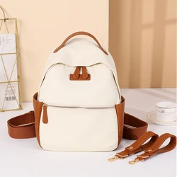 Mini canvas and vegan leather diaper bags multifunction baby bags including changing mat and stroller straps