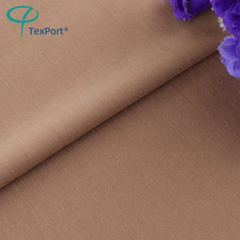 Wholesale 60S 62% Rayon 30% Nylon 8% Lycrta Stretch Plain Dyed Knitted Tencel Roma Fabric For Clothes Making 220Gsm