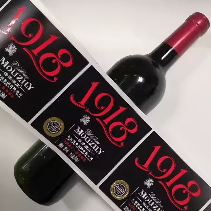 Custom Printed Self-Adhesive Wine Bottle Label with Hot Stamped Silver or Gold UV Logo, Made of Synthetic Paper Material.