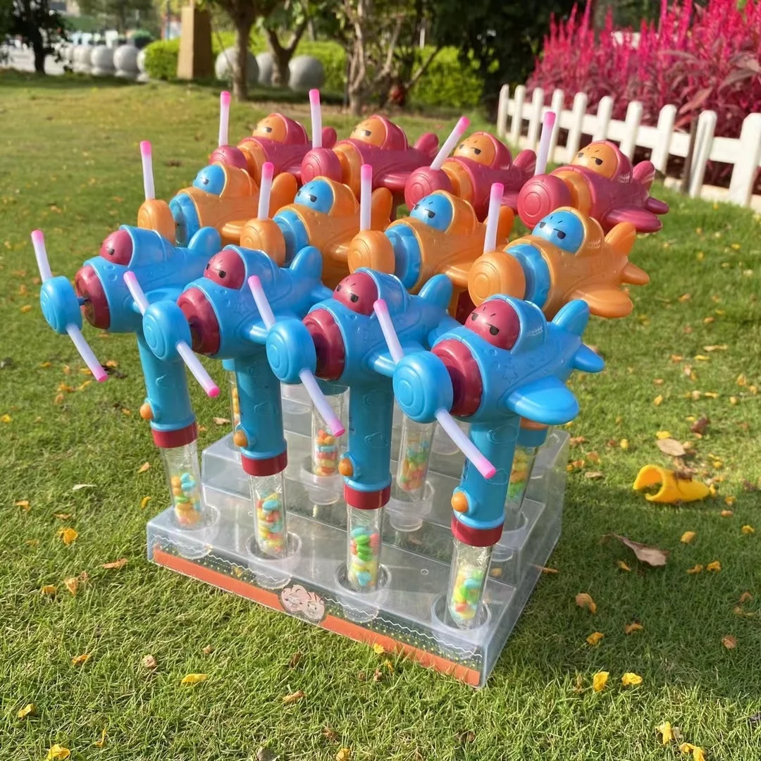 2024 Novelty design Macaron color hot sale Battery operated airplane fan candy toys lights up handheld fan toy Candy Toy