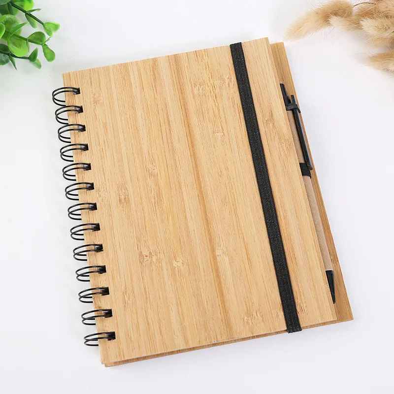 Cheaper recycled notebooks customizable laser logo spiral binding bamboo notebook customer gifts kraft notebook with pen bandage