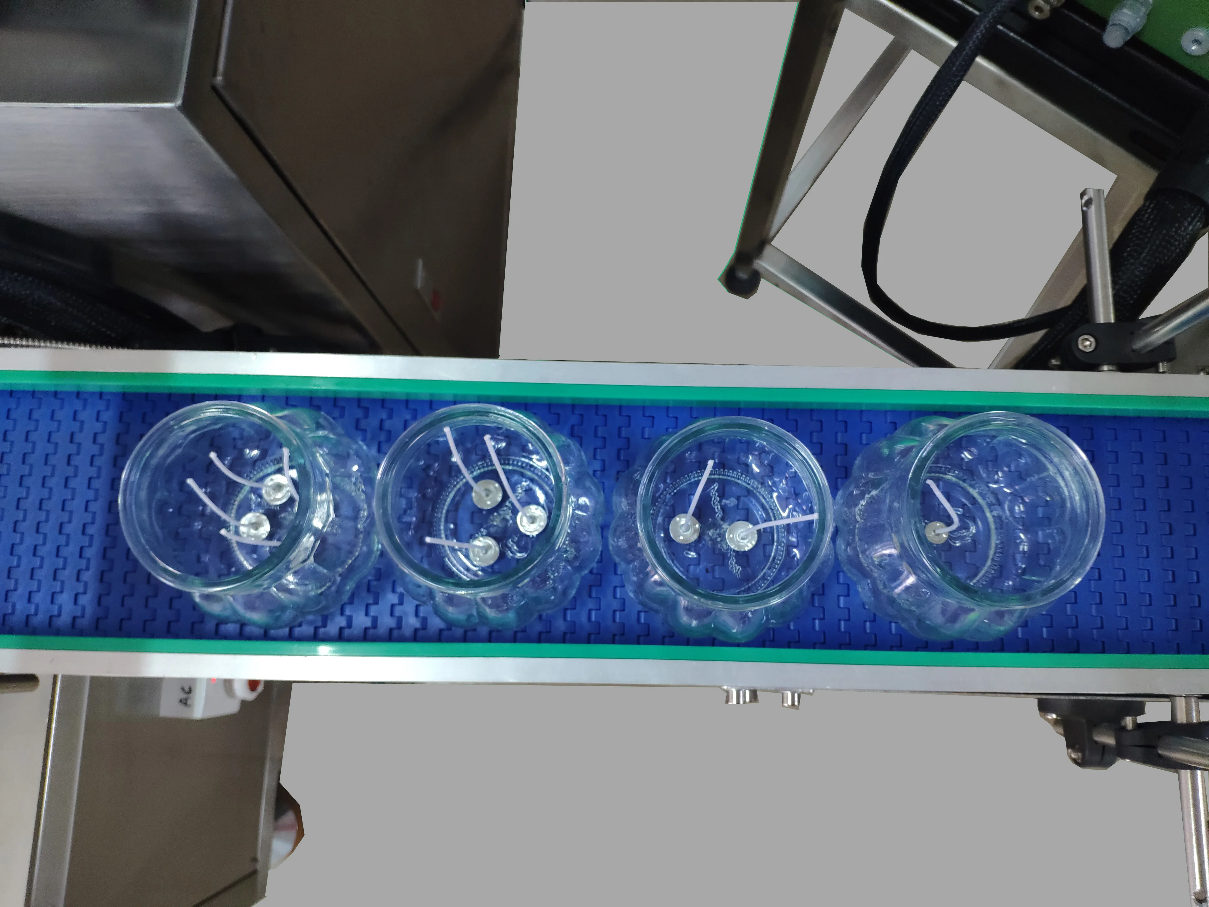 Wick inserting machine for small to medium outputs Very flexible since no format parts are necessary